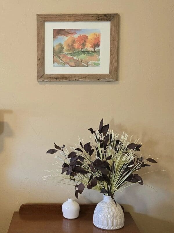 A vase of flowers sitting on top of a table.