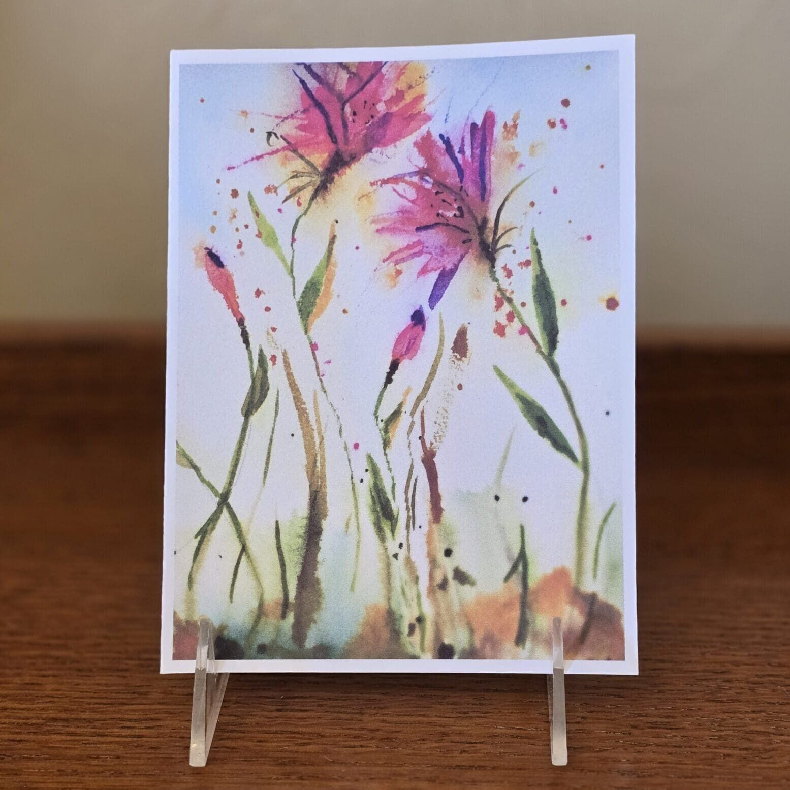 A painting of flowers on top of a table.